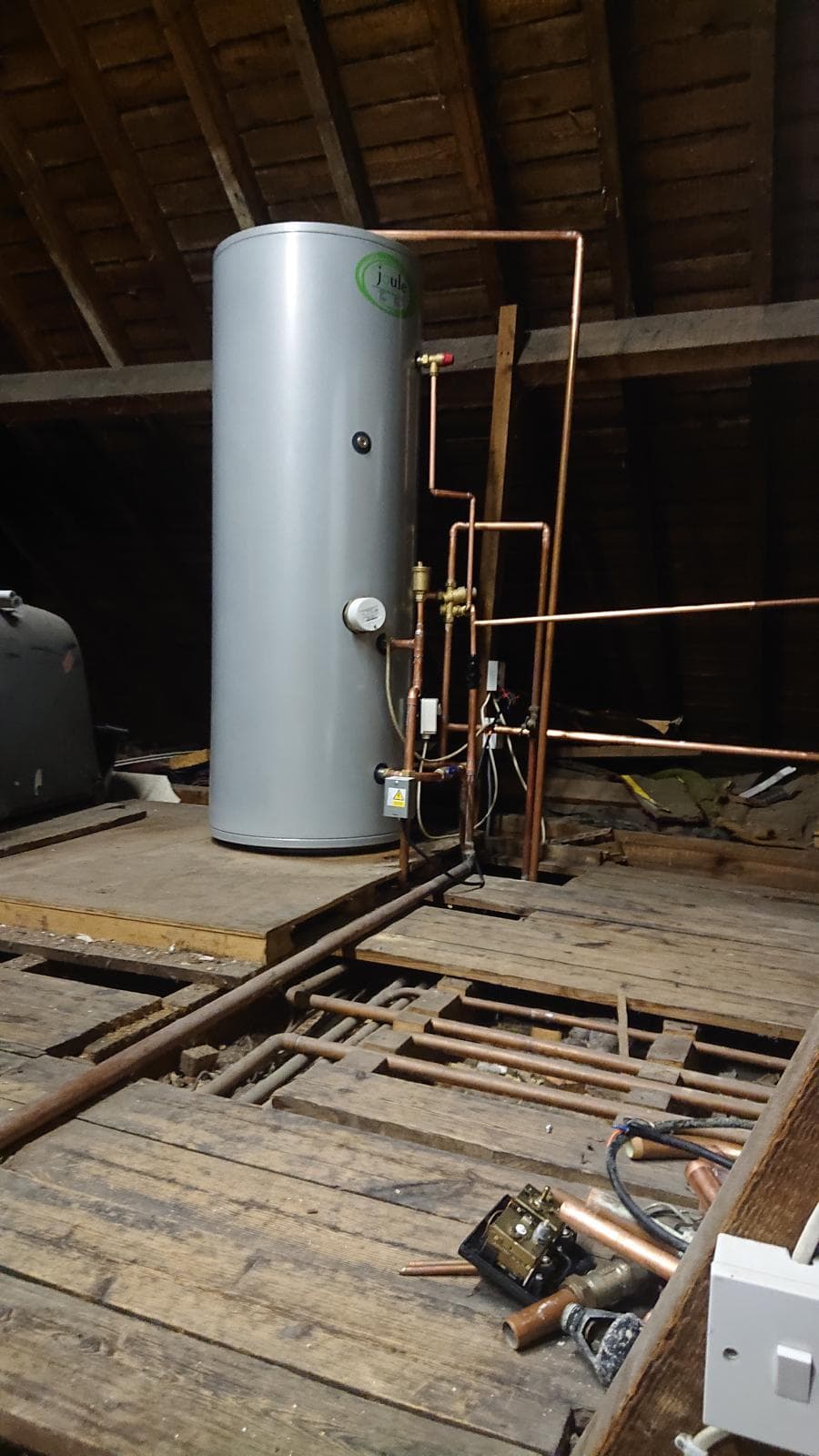 Joule unvented hot water cylinder installed by LJS in a loft with new copper pipework